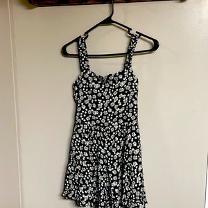Short floral romper. Size small. Never worn. Francesca’s